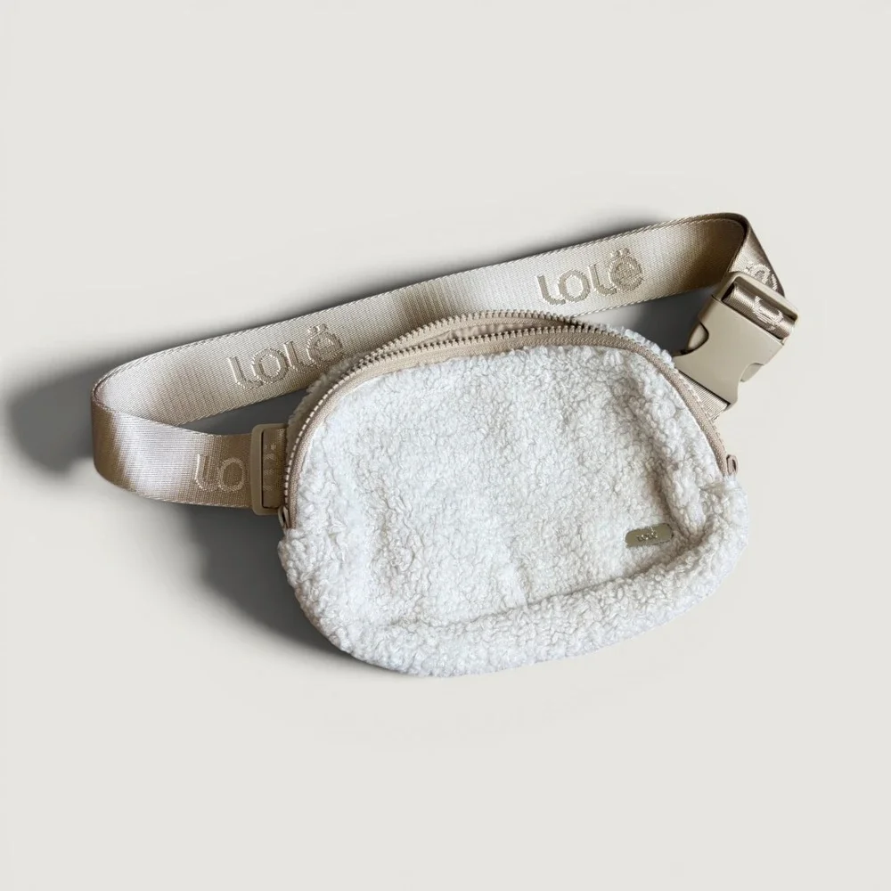 LOLË Unisex Convertible Fleece Belt Bag, Cross Body Design, Sherpa Ivory